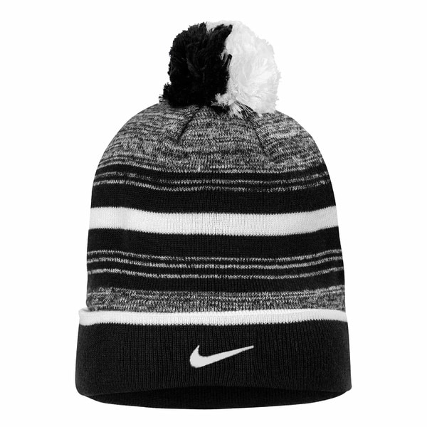 Back view of black and white striped beanie with Nike logo on cuff and pom-pom top
